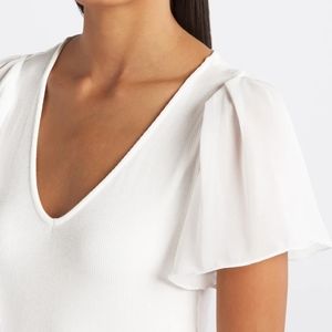 1. State Flutter - Knit V-Neck Top in White